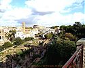 Forum Romanum, Rome, eastern neighbourhood. Remains of the Basilica of Maxentius and Constantine, church Santa Francesca Romana, Colosseum and arch of Titus. View from the northern Palatine Hill. 